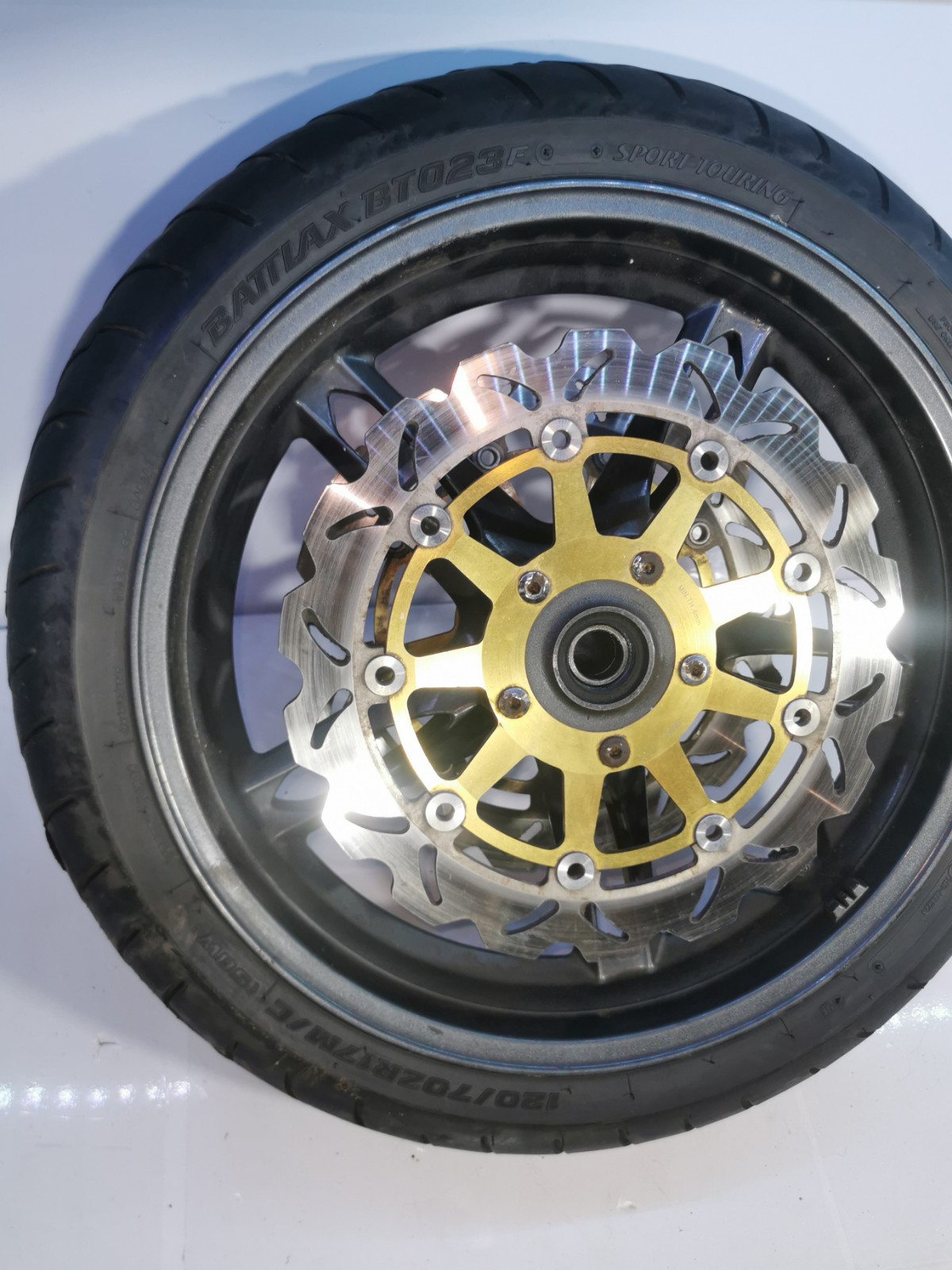 Triumph Sprint ST 1050 Front Wheel, Tyre + Brake Discs