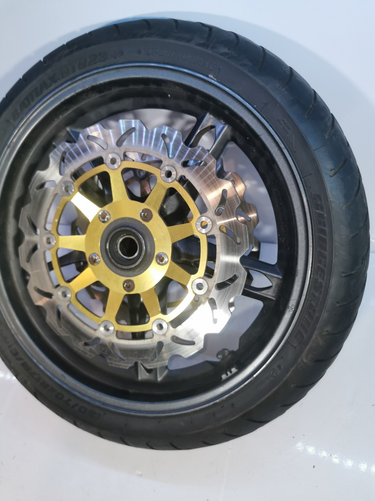 Triumph Sprint ST 1050 Front Wheel, Tyre + Brake Discs