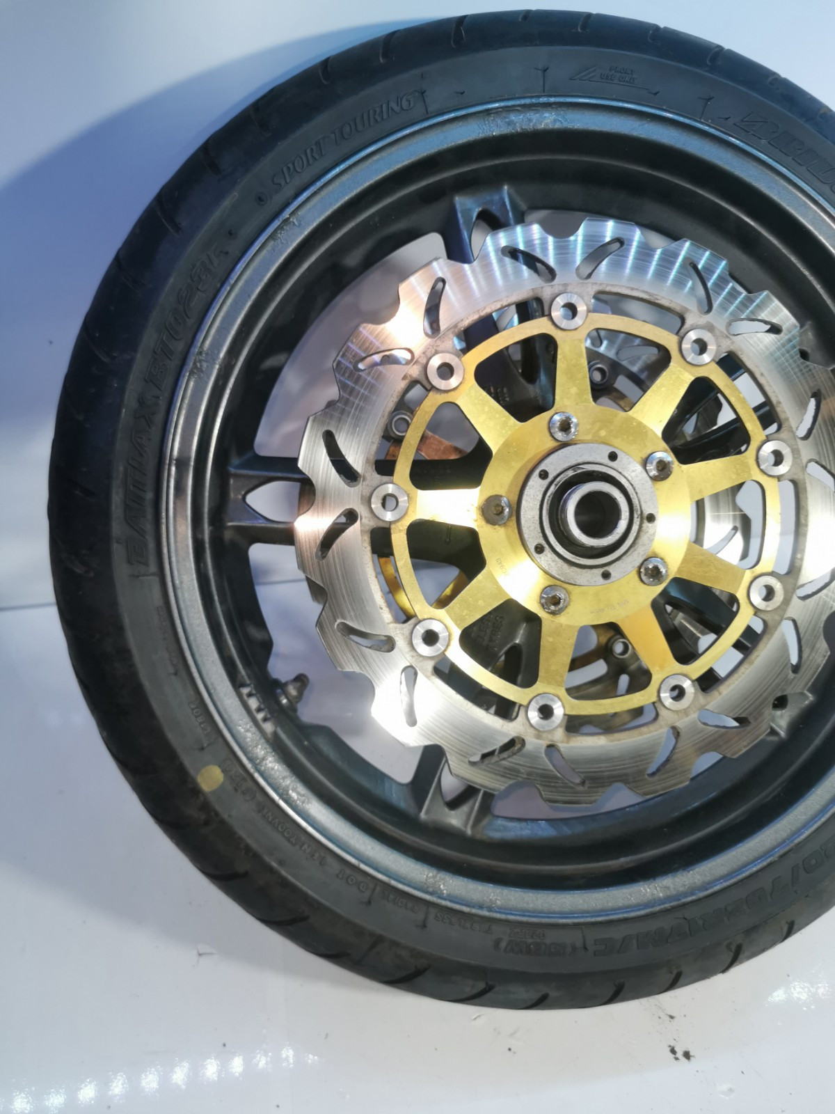 Triumph Sprint ST 1050 Front Wheel, Tyre + Brake Discs