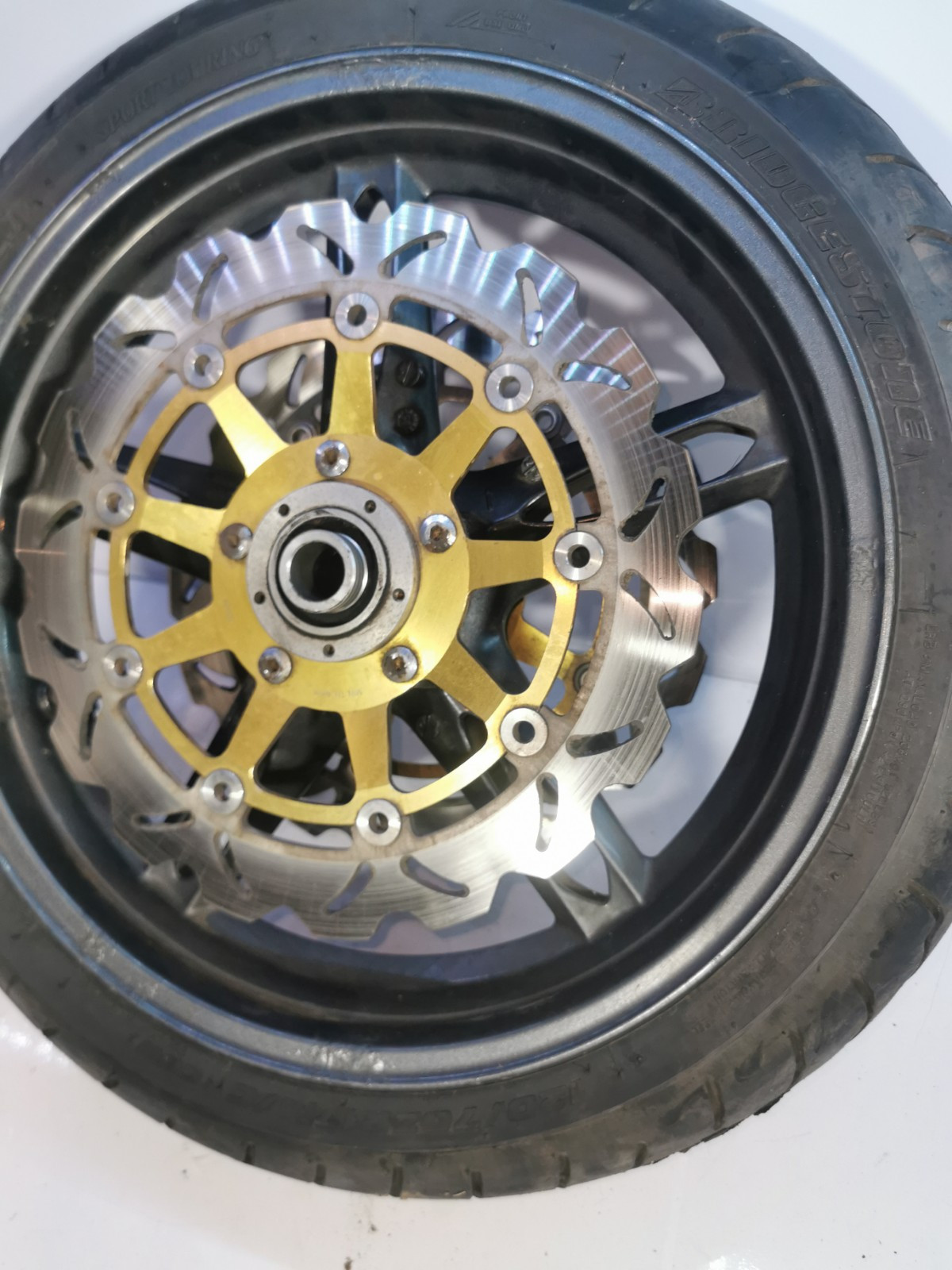 Triumph Sprint ST 1050 Front Wheel, Tyre + Brake Discs