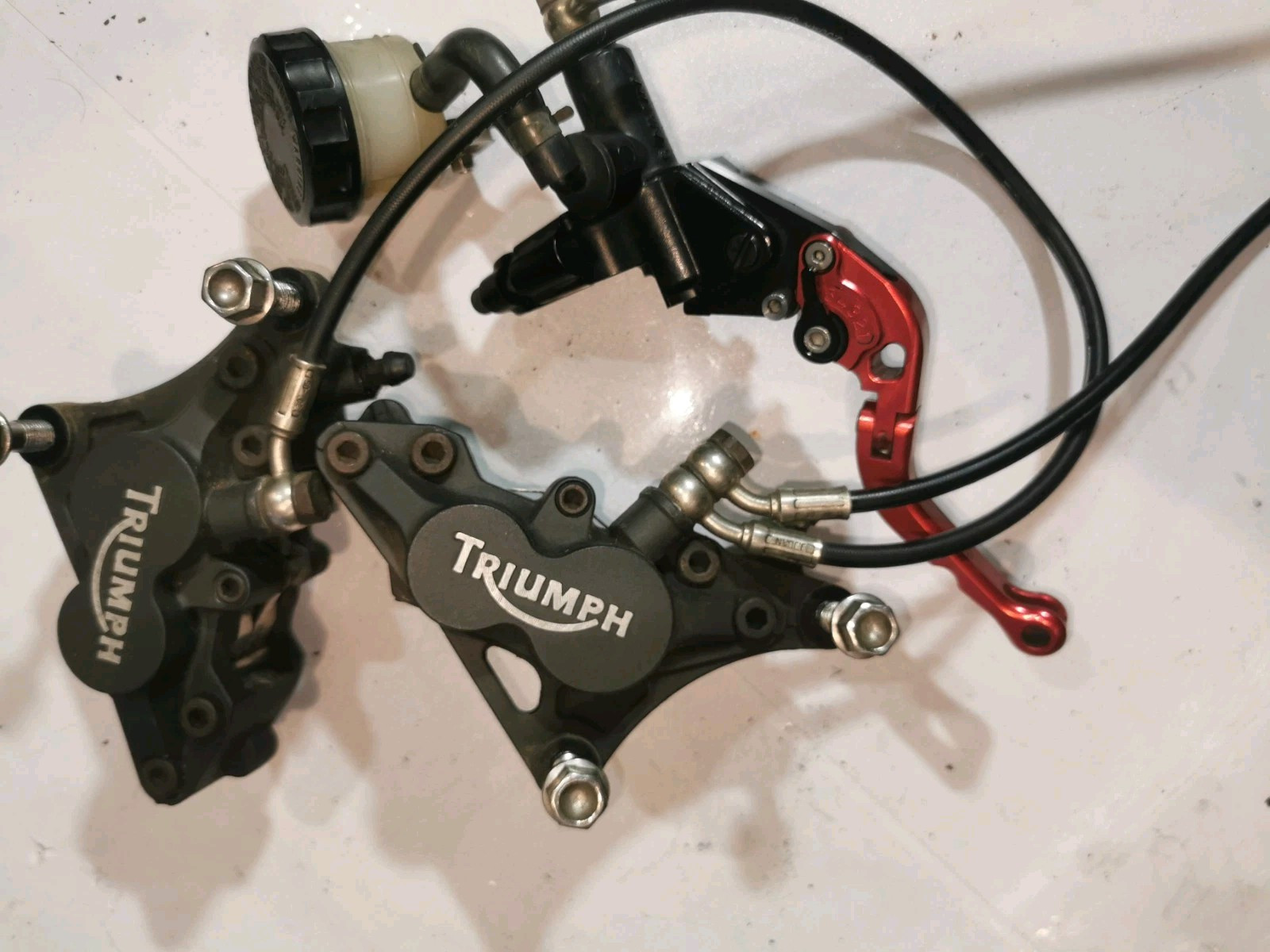 TRIUMPH SPRINT ST 1050 1050 BRAKE CALIPER FRONT AND BRAKE LEVER