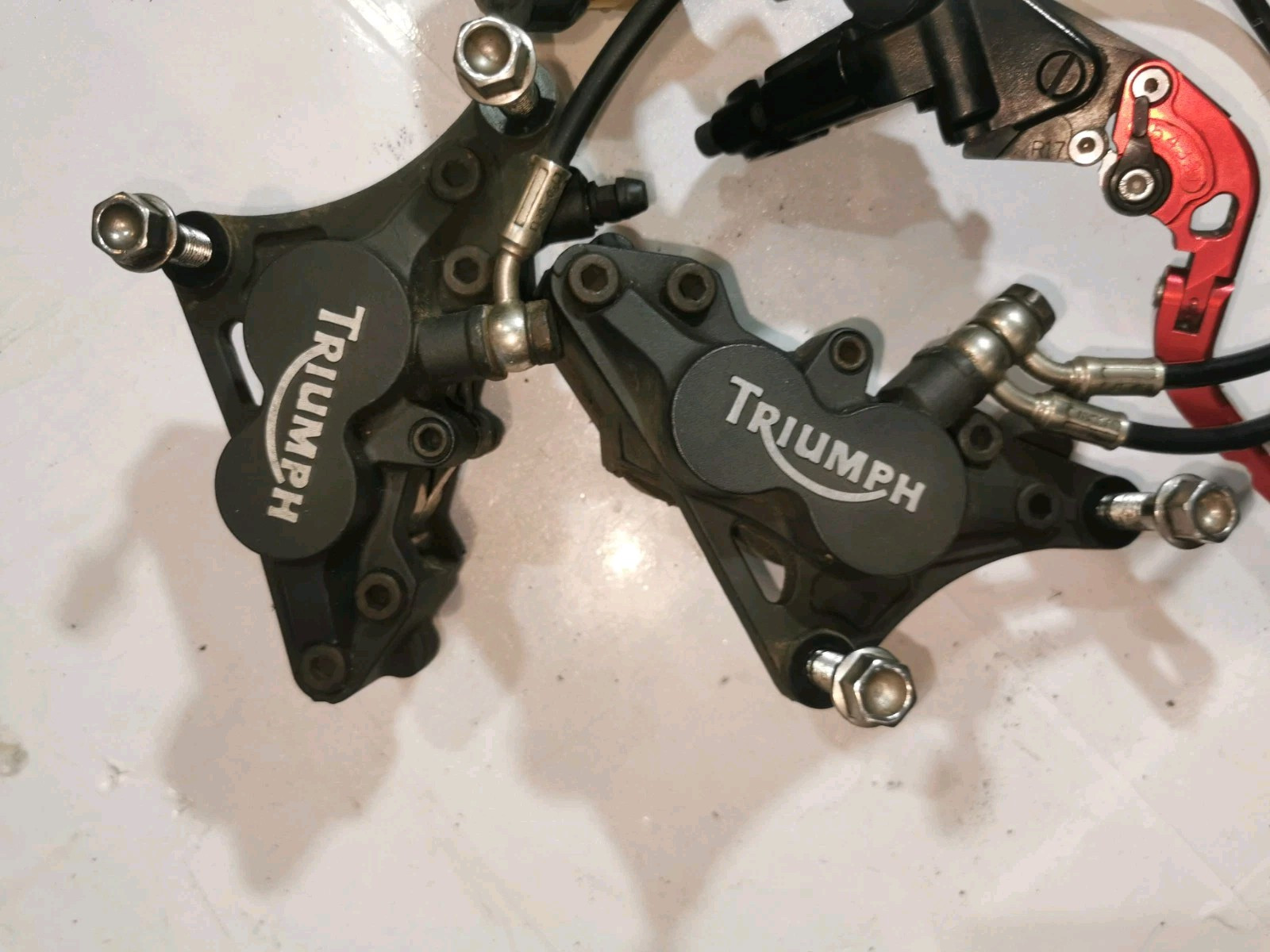 TRIUMPH SPRINT ST 1050 1050 BRAKE CALIPER FRONT AND BRAKE LEVER