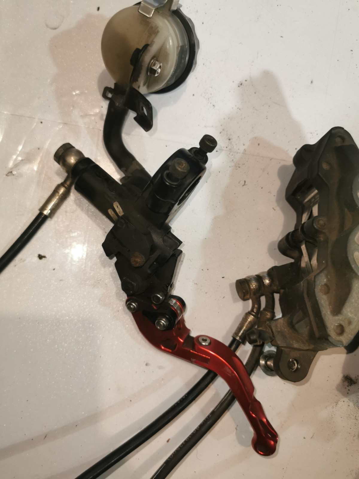 TRIUMPH SPRINT ST 1050 1050 BRAKE CALIPER FRONT AND BRAKE LEVER